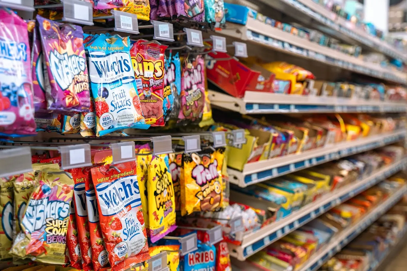 Candy shelves — Welch's, Rips, Haribo, Sour