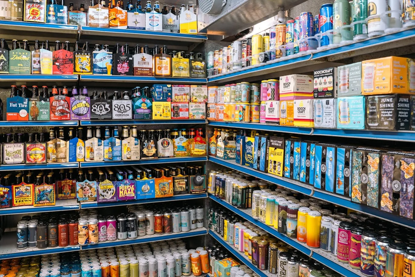 Wall of colorful craft beer cans at Cardiff Valero liquor store